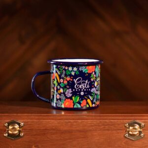 Metal mug with a floral pattern
